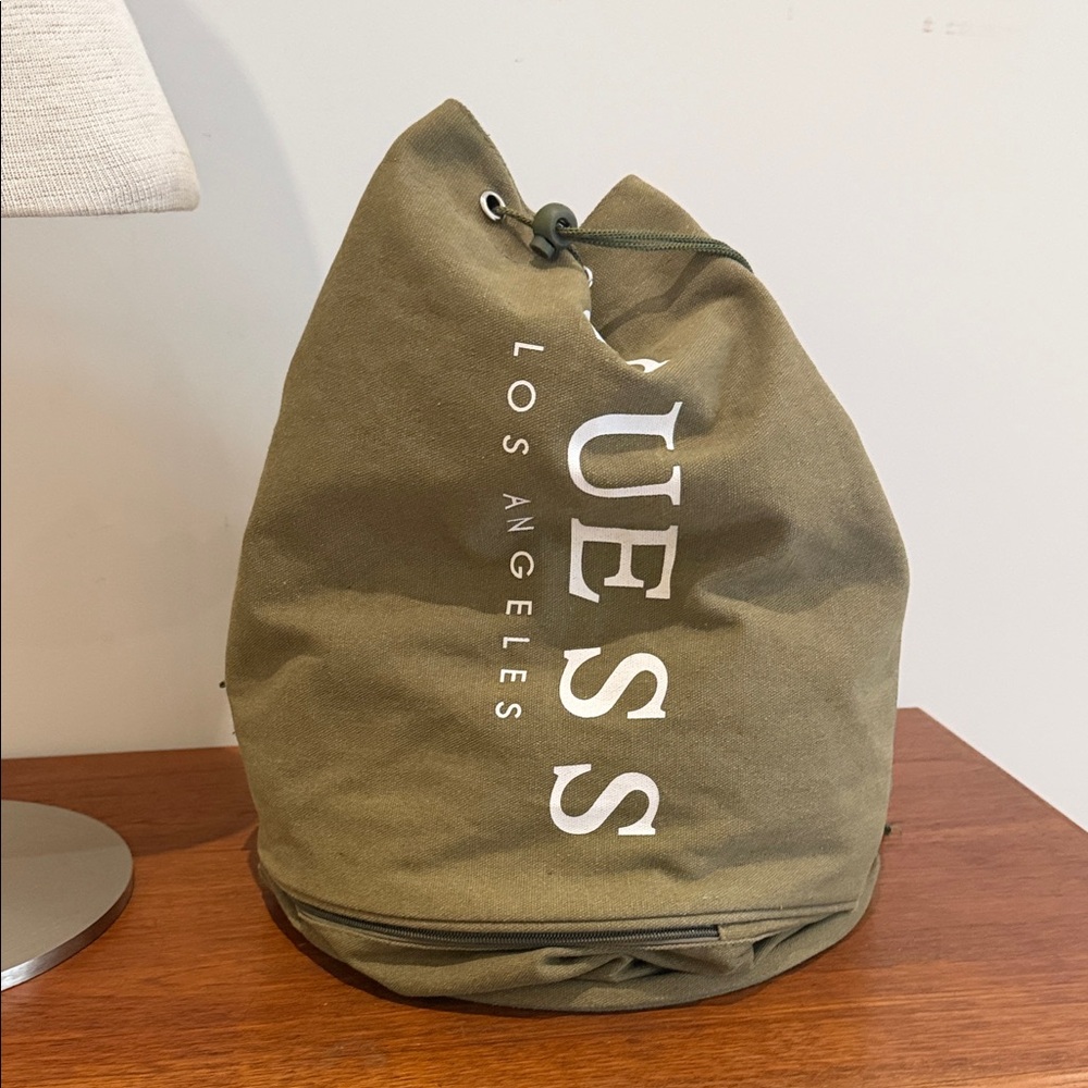 Vintage Guess Sling Duffel Bag Green 2 layers of storage lined bag 

19” x 10”